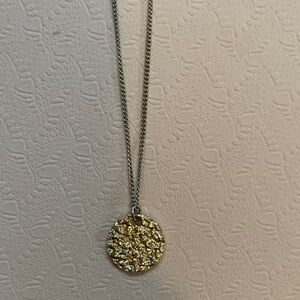 Elegant Gold and Silver Pendant Necklace